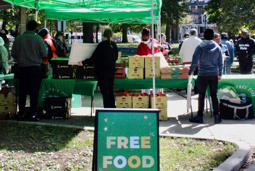 Free Food sign and stall set up in park